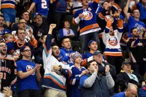 Loyal hockey fans cheering their team on